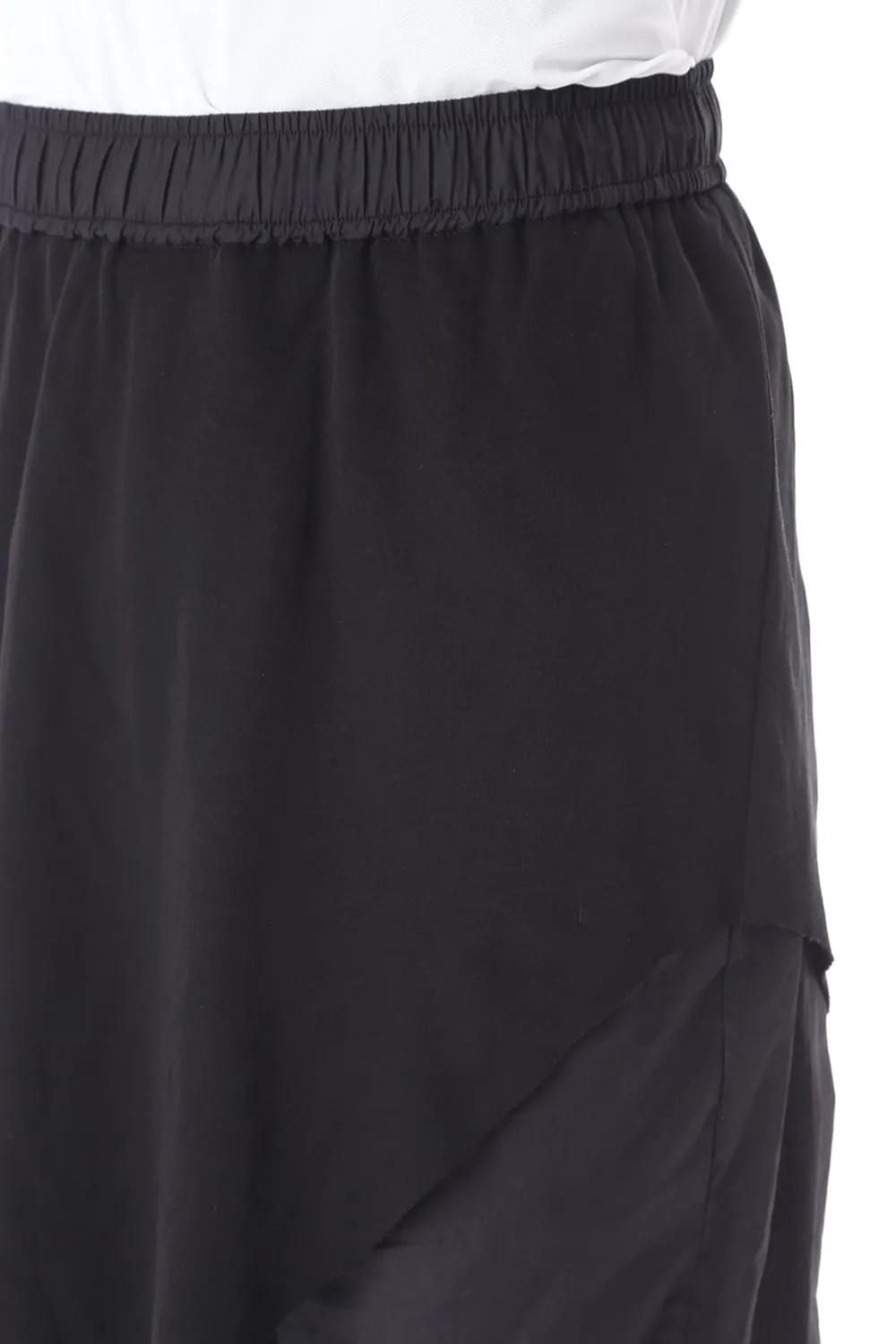 CURVED LEG SKIRT PANTS