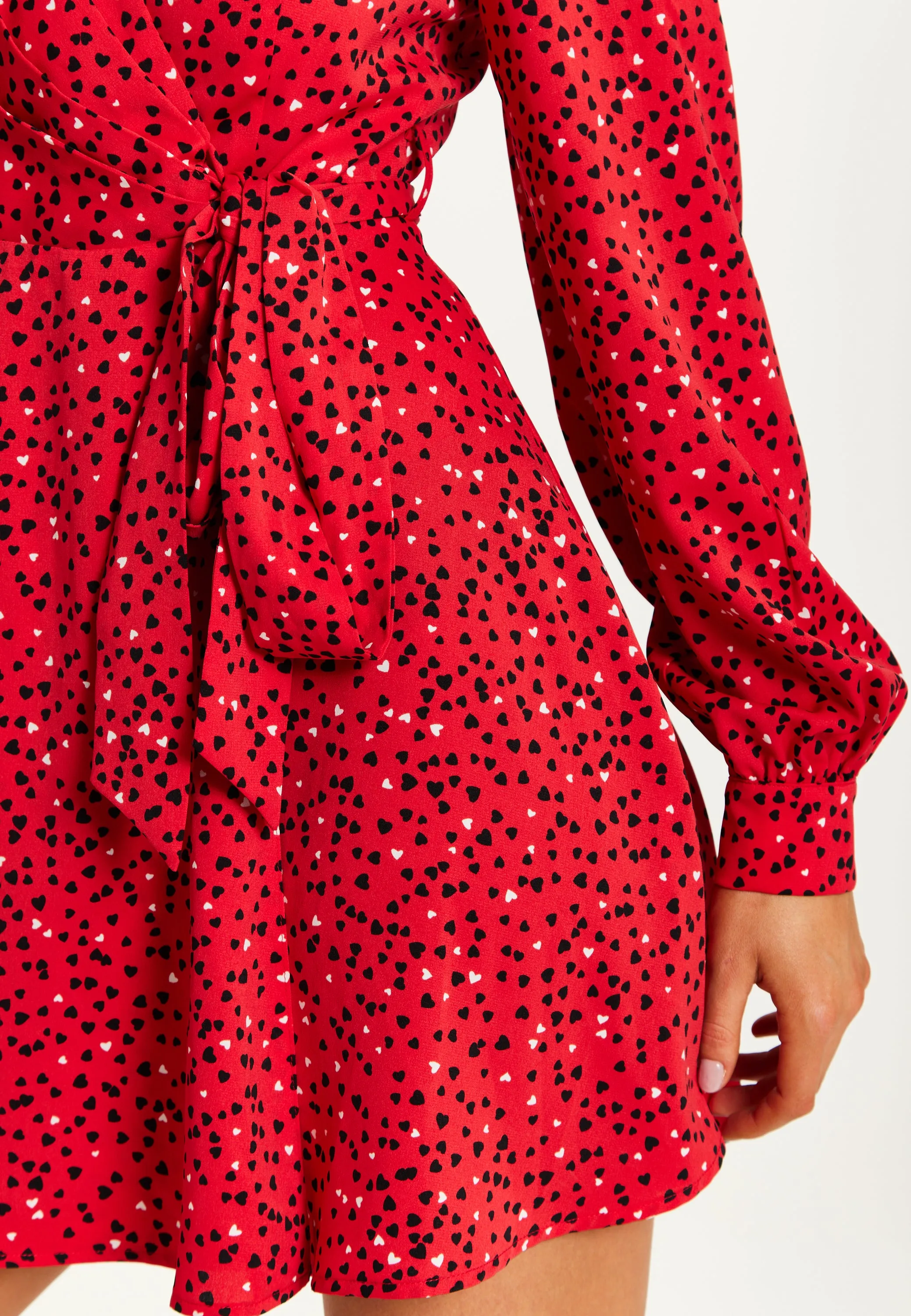 Women's Mini Dress with Long Sleeves in Red - Heart Print Wrap Style, V Neck, Adjustable Tie Waist, by Liquorish